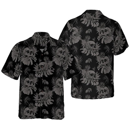 Camiseta con calaveras, hojas y plantas tropicales