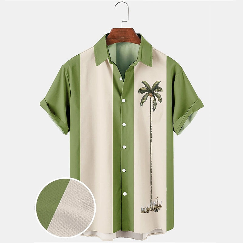 Camisa con diseño de plantas tropicales y cocoteros en bloques de color