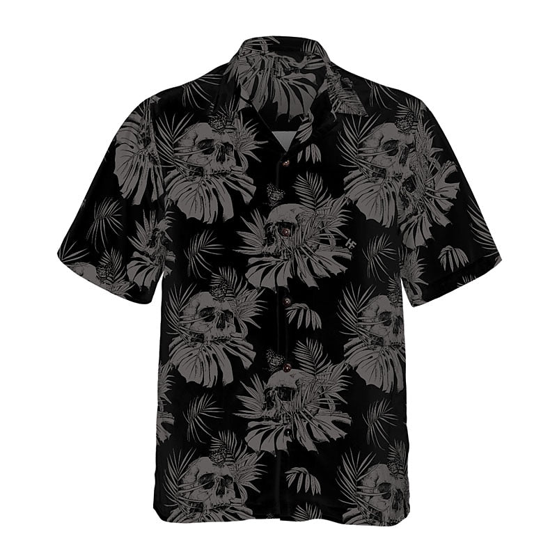 Camiseta con calaveras, hojas y plantas tropicales