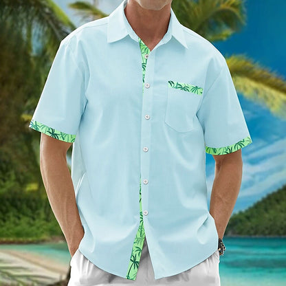 Camisa hawaiana de verano con plantas tropicales