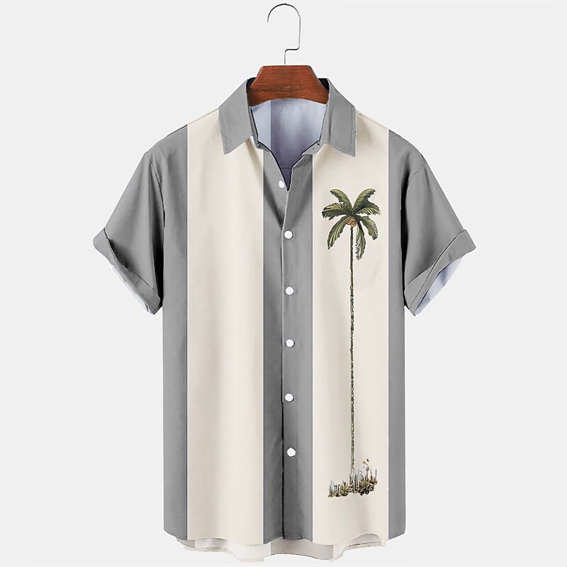 Camisa con diseño de plantas tropicales y cocoteros en bloques de color