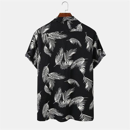 Camisa hawaiana de verano con cuello de campamento y estampado de plantas tropicales y plumas