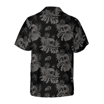 Camiseta con calaveras, hojas y plantas tropicales